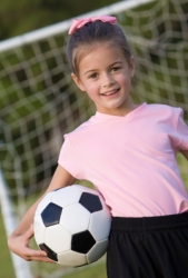 Elementary Girl Student Playing Football