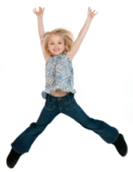 Happy Elementary Girl Student Jumping In Air