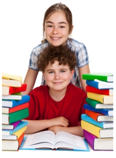 boy and girl elementary school students reading books