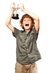 Boy Holding Trophy